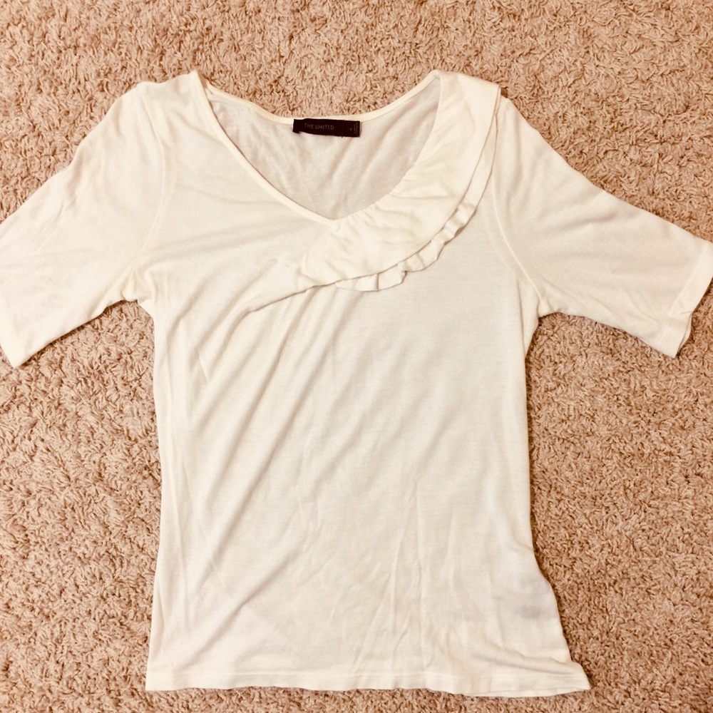 The limited off white super soft blouse